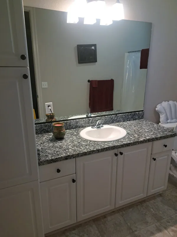 Bathroom vanity with a granite counter