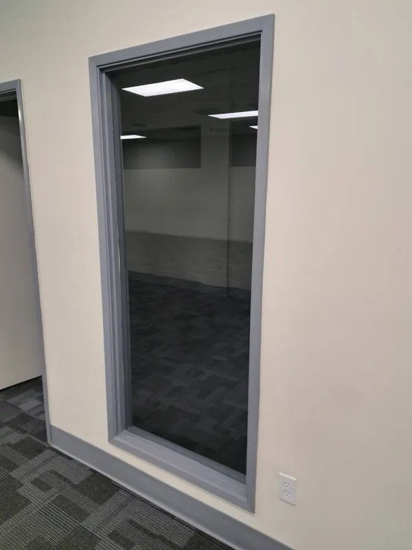 Office doorway with carpet tile flooring
